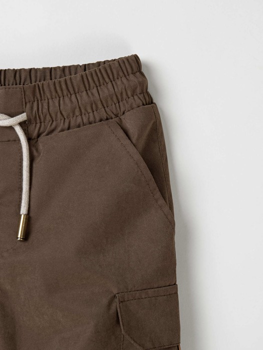 брюки демисезонные "кофе" по цене 3299 руб вид справа