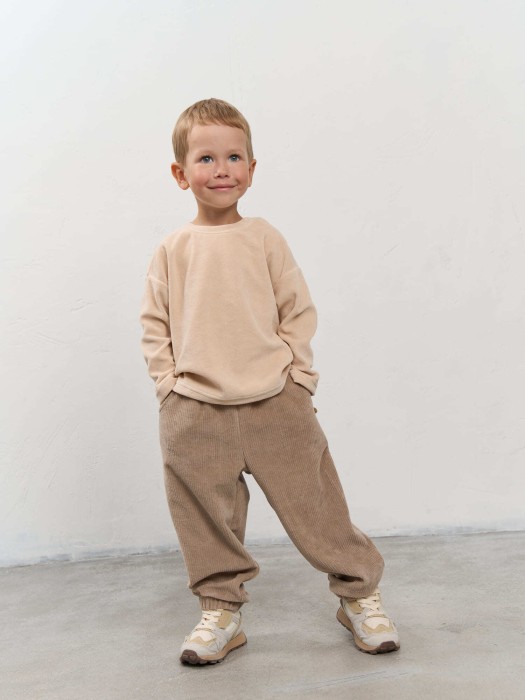 брюки из трикотажного вельвета "латте" 0+ фотография