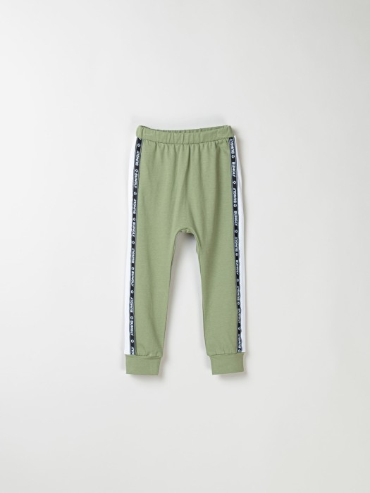 брюки со спущенным шагом и лампасами "олива" от бренда bungly вид слева