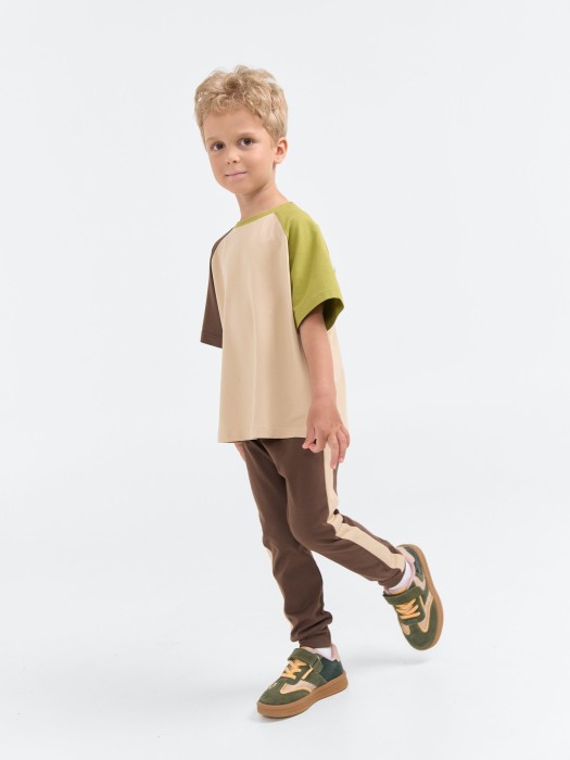 брюки со спущенным шагом и лампасами "шоколад" из россии вид сбоку