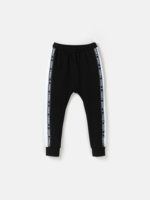 брюки со спущенным шагом и лампасами "уголь" фотография