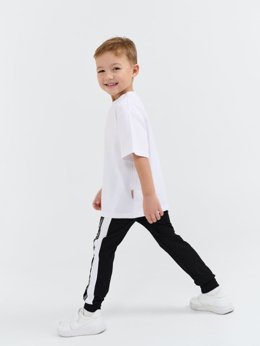 брюки со спущенным шагом и лампасами "уголь" по цене 1199 руб вид справа