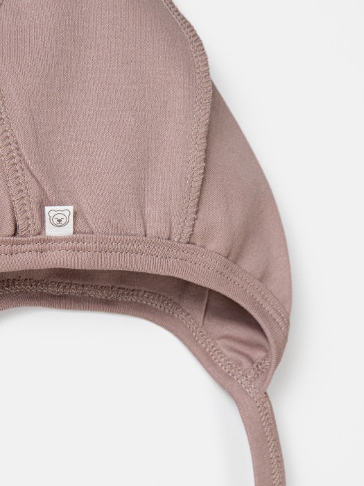 чепчик "кокос" 0+ от бренда bungly вид слева