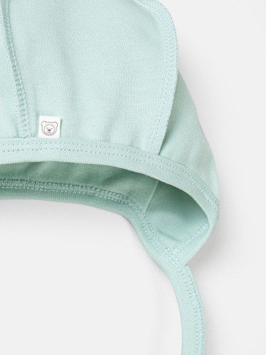 чепчик "шалфей" 0+ от бренда bungly вид слева