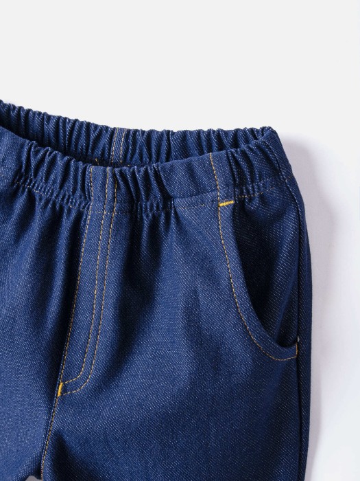 чиносы из джинскота "джинс" по цене 1999 руб вид справа