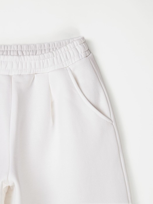 джоггеры багги утепленные "сахар" женские от бренда bungly вид слева