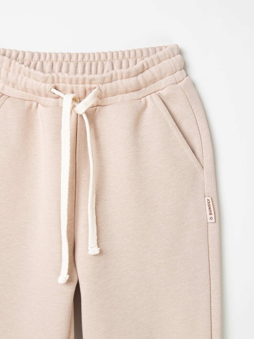 джоггеры "беж" 7+ по цене 1889 руб вид справа