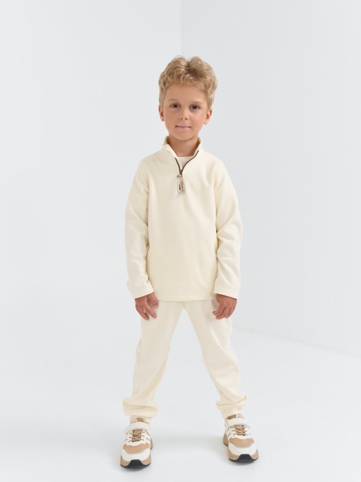 джоггеры флисовые "молоко" из россии вид сбоку