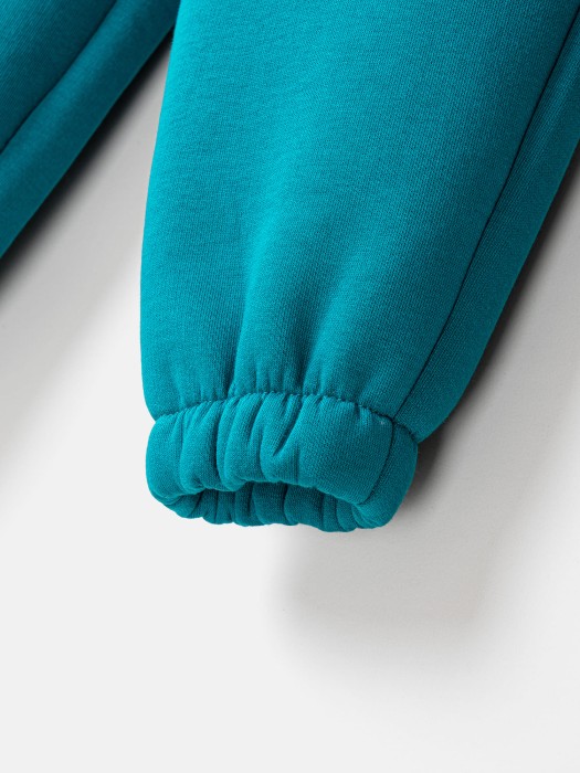 джоггеры "изумруд" утепленные из россии вид сбоку