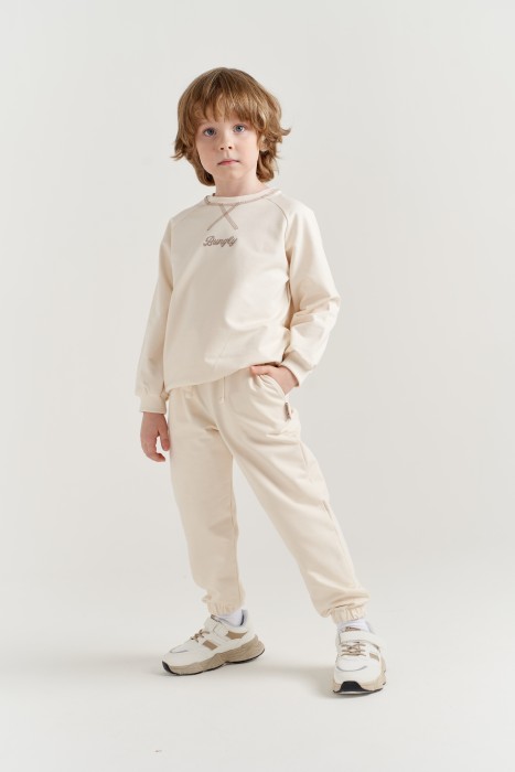 джоггеры облегченные "лён" с карманами от бренда bungly вид слева