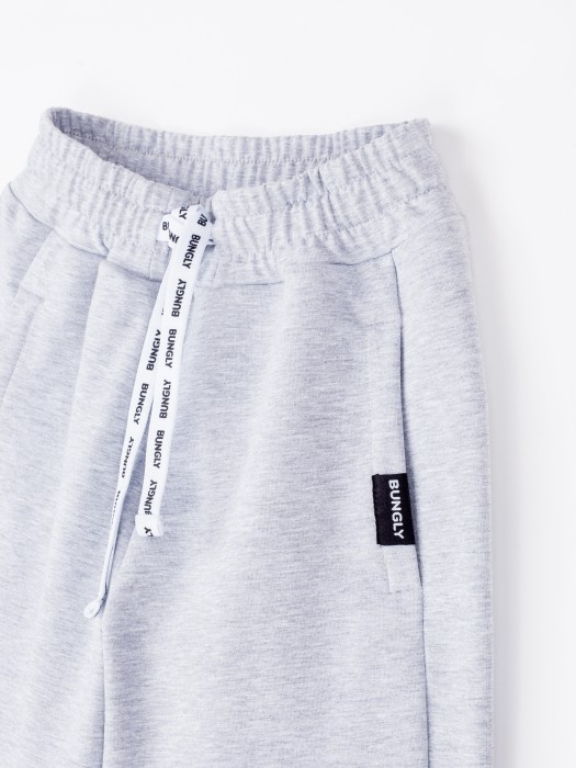 джоггеры облегченные "серый меланж" с карманами 7+ по цене 2799 руб вид справа