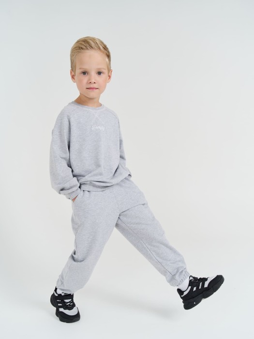 джоггеры облегченные "серый меланж" с карманами от бренда bungly вид слева