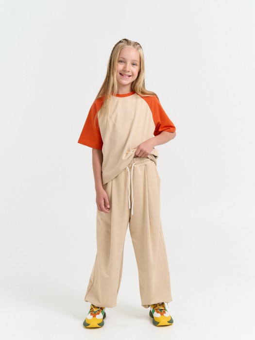 джоггеры оверсайз облегченные "крем-брюле" с карманами 7+ фотография