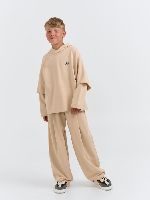 джоггеры оверсайз облегченные "крем-брюле" с карманами 7+ из проверенных материалов спереди