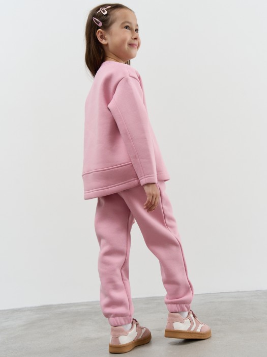 джоггеры "пудра" с карманами утепленные из россии вид сбоку