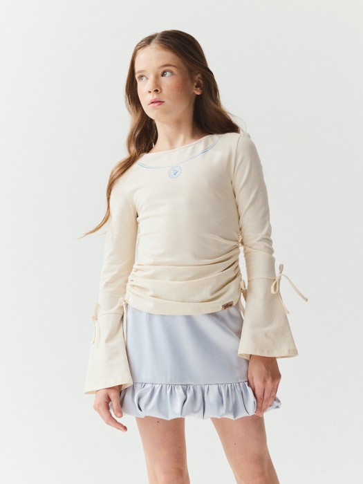 лонгслив "медальон" 7+ по цене 2999 руб вид справа