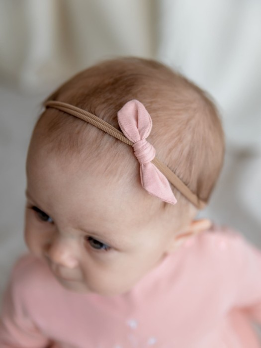 повязка с бантиком "персик" 0+ фотография