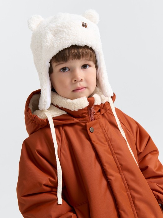 шапка-ушанка меховая "молоко" 0+ из россии вид сбоку