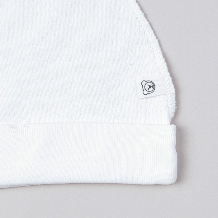 шапочка для недоношенных "тофу" 0+ от бренда bungly вид слева