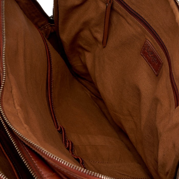 Товар коричневого цвета с внутренней стороны