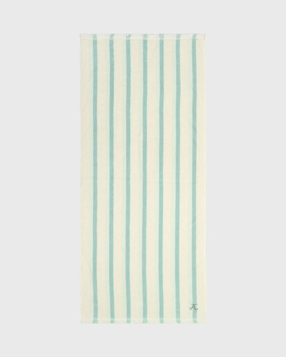 детское пляжное полотенце в полоску фотография