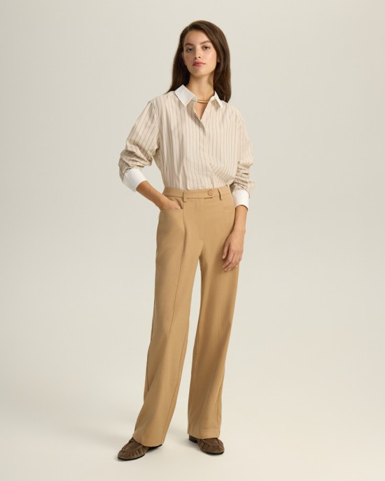 прямые брюки с отстрочками фотография