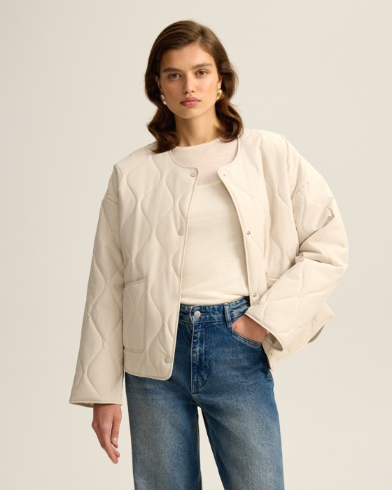 стеганая куртка с водоотталкивающей пропиткой фотография