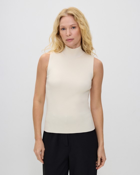 трикотажный топ с воротником стойкой из вискозы фотография