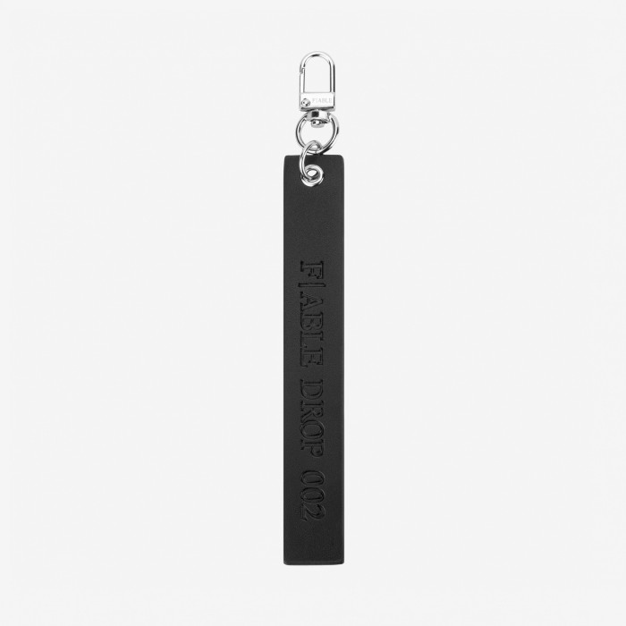 брелок leather black фотография