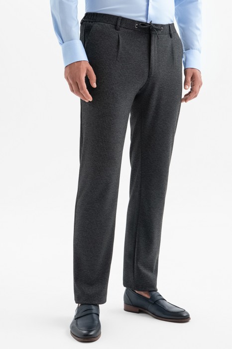 брюки из трикотажной ткани на кулиске фотография