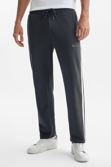 брюки спортивные из хлопка с лампасами фотография