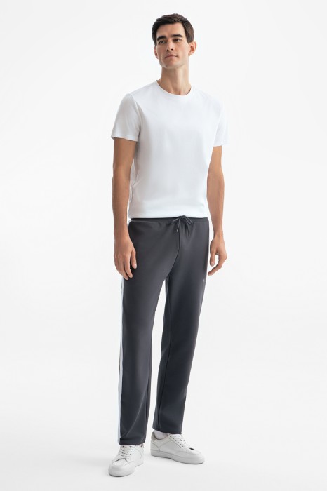 брюки спортивные из хлопка с лампасами из россии вид сбоку