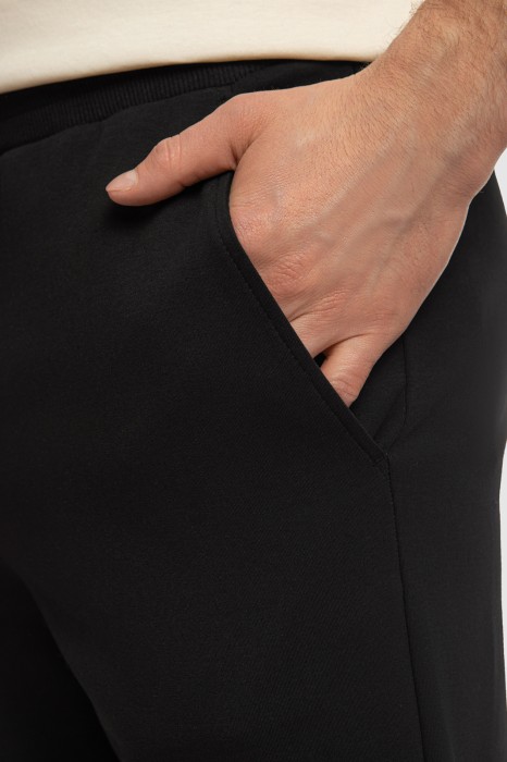 брюки спортивные из хлопка от бренда kanzler вид слева