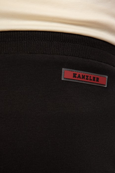 брюки спортивные из хлопка по цене 5990 руб вид справа