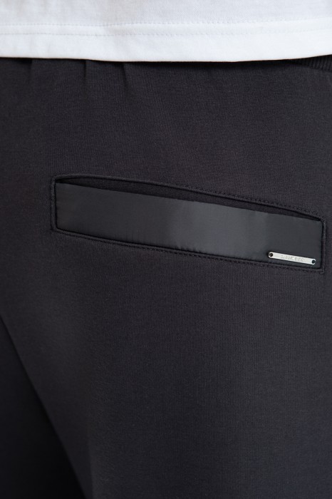 брюки спортивные из хлопка по цене 9990 руб вид справа