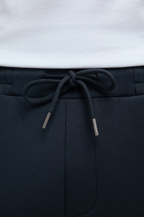 брюки спортивные из хлопка от бренда kanzler вид слева