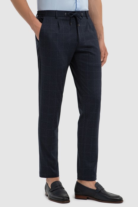 брюки в клетку на кулиске из россии вид сбоку