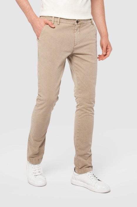 брюки зауженные бежевые из хлопка фотография