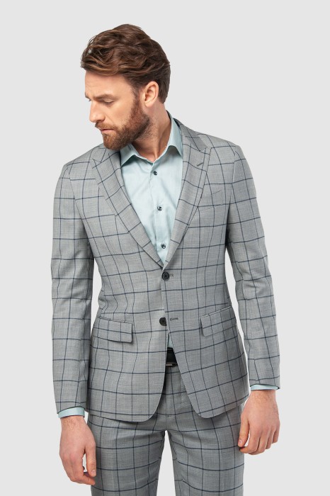 пиджак из шерсти в клетку фотография