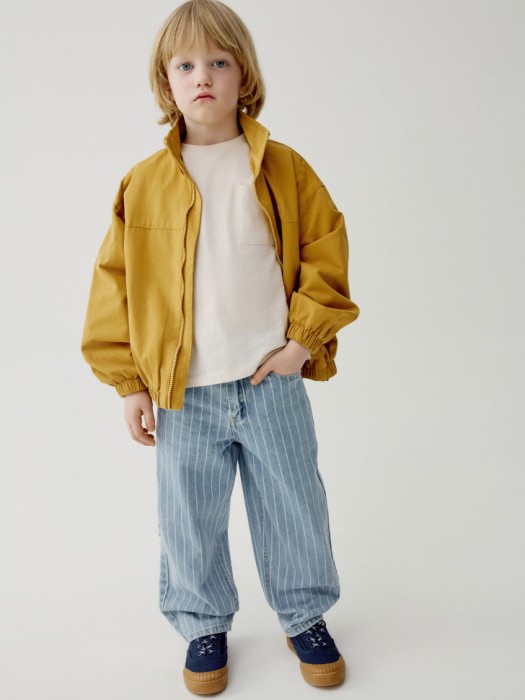 базовая футболка с карманом детская от бренда sela вид слева