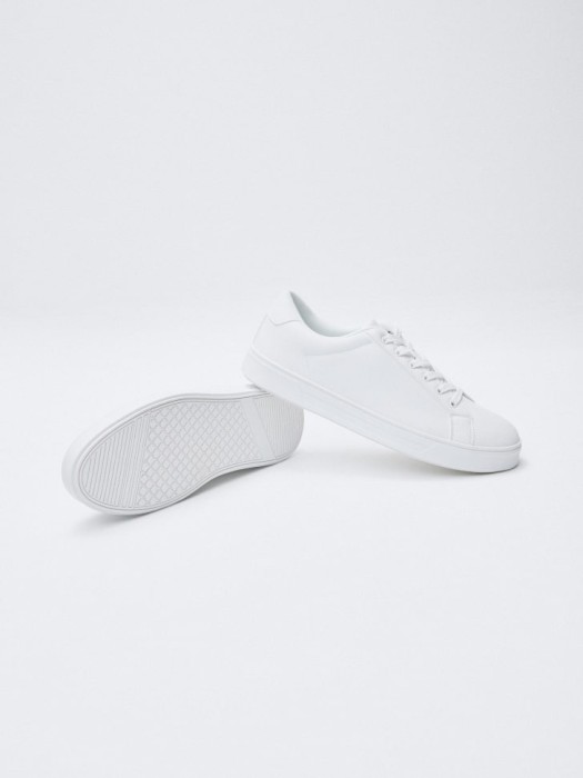 базовые кеды из искусственной кожи от бренда sela вид слева