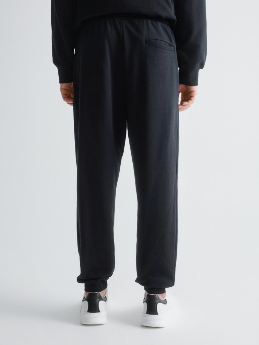 базовые трикотажные джоггеры со средней посадкой из россии вид сбоку