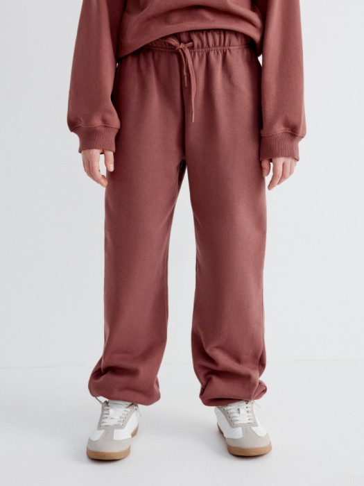 базовые утепленные джоггеры детские от бренда sela вид слева