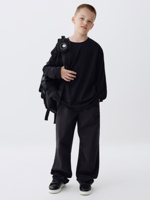 базовый лонгслив детский от бренда sela вид слева