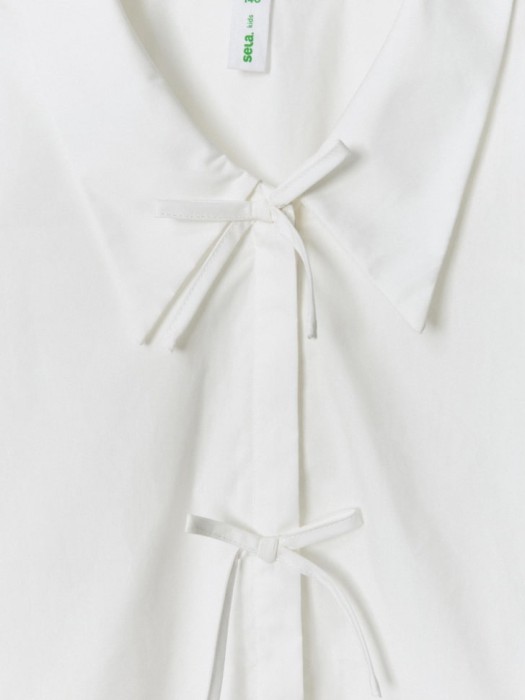 блузка с бантиками для девочек из россии вид сбоку