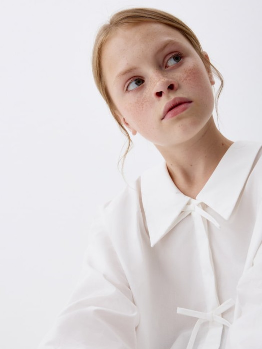 блузка с бантиками для девочек универсального стиля с лицевой стороны