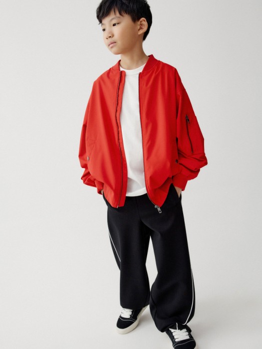 бомбер оверсайз для мальчиков от бренда sela вид слева