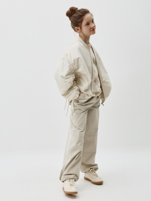 бомбер оверсайз с драпировкой для девочек от бренда sela вид слева