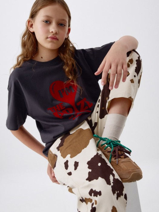 брюки с коровьим принтом для девочек из россии вид сбоку