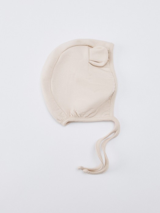 чепчик из хлопка с ушками для малышей от бренда sela вид слева